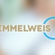Verschwommenes Bild mit dem Semmelweis-Logo im Vordergrund