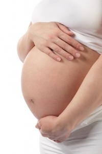 Foto von einer Schwangeren mit Babybauch