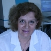 Portrait von Univ.-Prof. Dr. Rossitza Vatcheva-Dobrevska in einem weißen Arztkittel