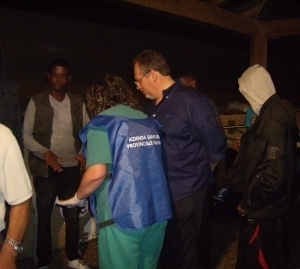 Picture of Dr. Santino Severoni with Refugees