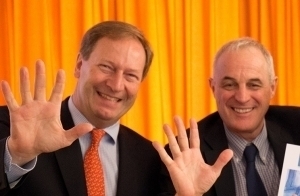 Picture of Bernhard Küenburg and Didier Pittet waving hands at the CEE Conference